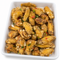 Ailes de poulet sautées à l’ail – 100 g